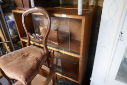 Two mid century teak bookcases, with glass sliding doors