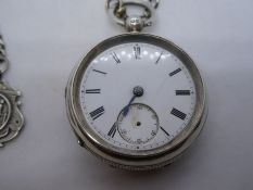 Hallmarked silver pocket watch, no glass, case number 574986 hung on a metal watch chain with two ha