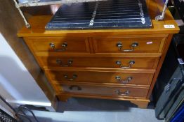 A reproduction Yew wood chest of drawers and a painted ladies bureau