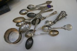 WITHDRAWNA quantity of silver flatware to include spoons, including souvenir napkin rings, including