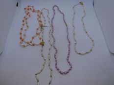 Collection of coral and pearl necklaces one with 14k marked clasp
