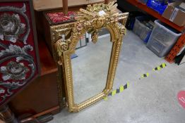 Two gold framed mirrors one depicting 'The Sun King'