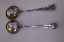 Two heavy silver shell shaped serving spoons of high quality. Hallmarked 1932 Sheffield Cooper Broth