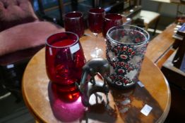 Collection of red glass, candle holder etc