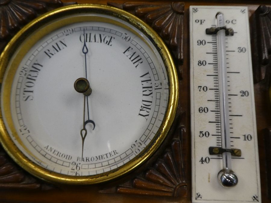 An early 20th century, clock barometer and thermometer set in carved wooden case with balustrade - Image 3 of 6