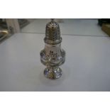 A stunning Victorian silver sugar sifter, very ornate and decorative. With beaded borders, ebonised