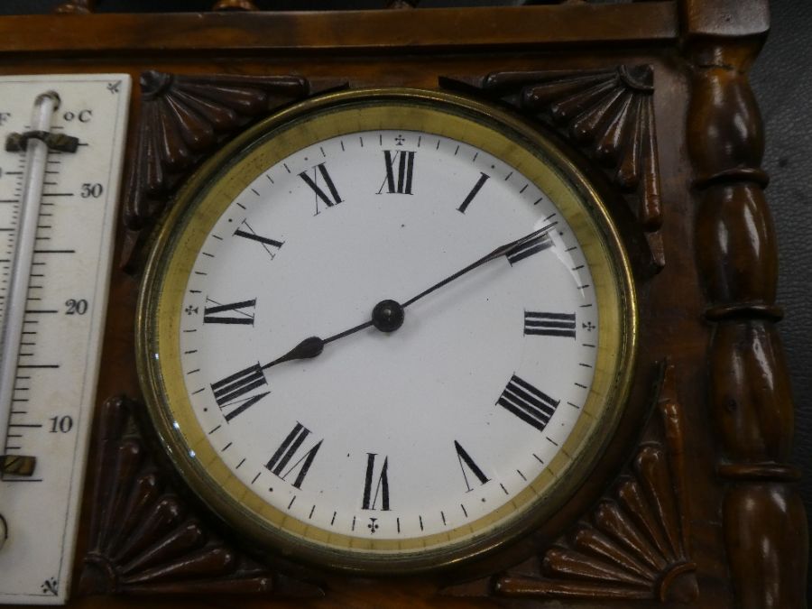 An early 20th century, clock barometer and thermometer set in carved wooden case with balustrade - Image 4 of 6