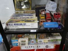 Seven playworn dinky rucks, a quantity of Airfix model kits and sundry