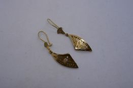Pair of gold high carat, possibly 18ct, Egyptian drop earrings, very decorative, Foreign markings, 6