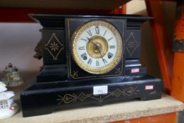 Decorative cast iron faux slate mantel clock with cast gilt decoration