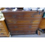 A late Victorian walnut chest having two short & three long drawers