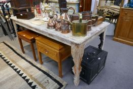 An antique French style oblong kitchen table having shaped legs, 180cm