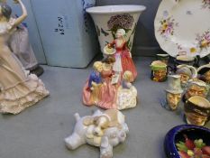 Two Royal Doulton figures, bedtime story and Janet, a Portmeirion vase and a Nao figure