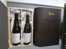 Brown leather holder from Harrods, holding 3 bottles of Champagne and 2 bottles of 2018 vintage whit