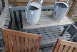 Weathered teak garden bench and coffee table