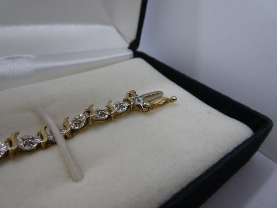 Pretty boxed 10K yellow and white illusion diamond set tennis bracelet, approx 19cm, 10K marked with - Image 3 of 6