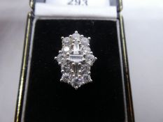 Beautiful 18ct white gold Art Deco diamond ring, with central baguette cut diamonds surrounded by br