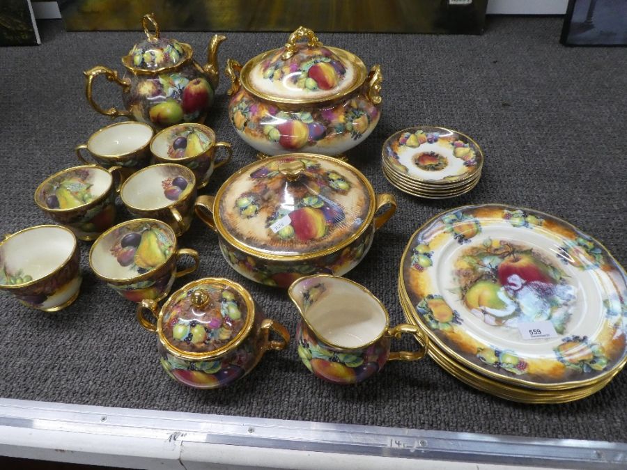 Raymond Everill, A quantity of Limehouse studio hand painted dinner ware decorated fruit