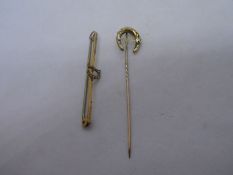 9ct yellow gold bar brooch and a 9ct yellow gold 'Luck' stick pin, 2.2g