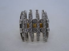 18ct two tone gold cocktail ring, Art Deco design, inset with diamonds, marked 18ct, AF, claws loose