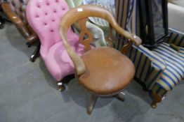 An old oak revolving desk chair