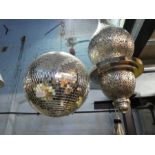 A Disco glitter ball and a Moroccan hanging light