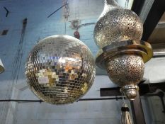 A Disco glitter ball and a Moroccan hanging light