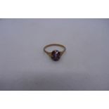 9ct Yellow gold dress ring with oval amethyst set in four claw mount, marked 9ct, size Q, 1.6g