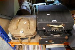 Collection of vintage typewriters including Triumph, Oliver etc and a cased gramophone