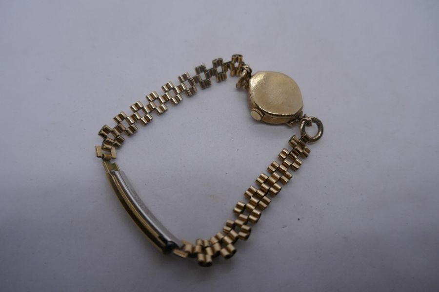 Vintage 9ct yellow gold Rotary watch, case marked 375, on a yellow metal strap and rolled gold clasp - Image 3 of 3