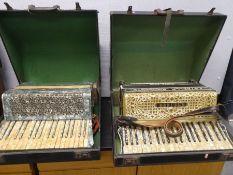 A vintage German piano accordian by Alvari and one other by Estrella example, both with cases