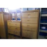A quantity of cotemporary oak bedroom furniture to include two chest of drawers, a dressing table an