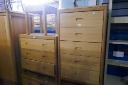 A quantity of cotemporary oak bedroom furniture to include two chest of drawers, a dressing table an