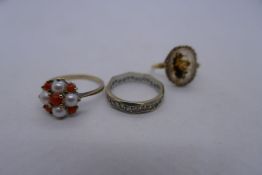 9ct Coral and pearl dress ring, 9ct gold clear stone eternity ring and a yellow metal silhouette aga
