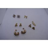 Collection of 9ct and other yellow metal earrings including a tri-gold graduated earrings 9.8g appro