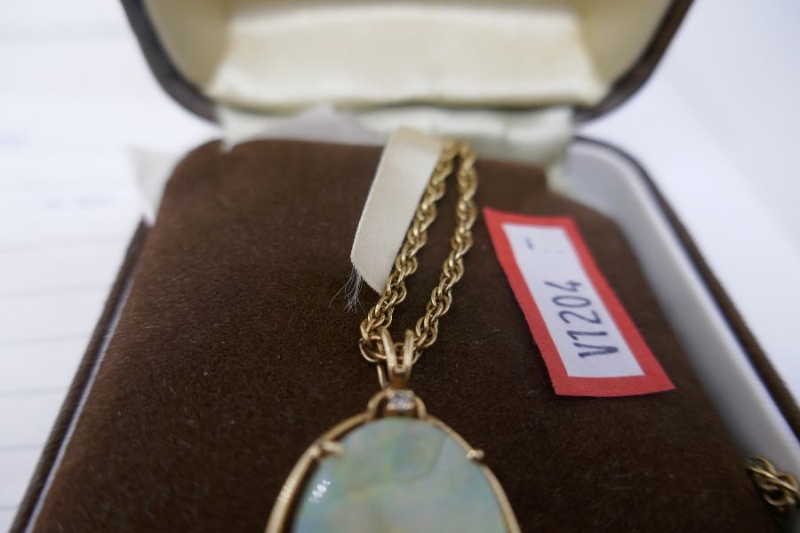 9ct yellow rope twist neckchain, marked 9ct, 7.8g hung with a 14K oval pendant with white opal and s - Image 3 of 8