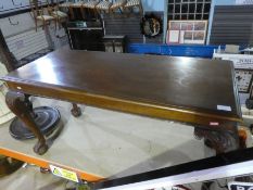 Rectangular mahogany coffee table on claw and ball supports