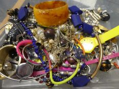 Tray containing contemporary costume jewellery to include bangles, earrings, chunky necklaces, Lapis