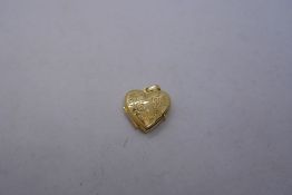 9ct yellow old heart shaped locket, engraved 'I Love You' marked 375, 2cm diameter, 2g approx