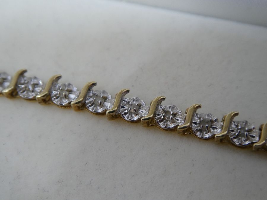 Pretty boxed 10K yellow and white illusion diamond set tennis bracelet, approx 19cm, 10K marked with - Image 5 of 6