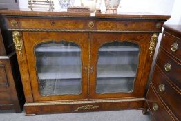 A 19th century French display cabinet having inlaid decoration with gilt metal mounts, 2 freize draw