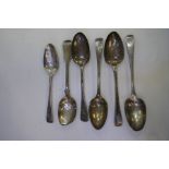 A quantity of five Georgian silver serving spoons, and one early Victorian silver serving spoon. Mak