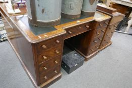 A Victorian twin pedestal desk having 9 drawers, 122cm