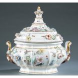 Oval porcelain tureen with crown finial.