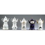 5 Sets of porcelain tea pots and warmers