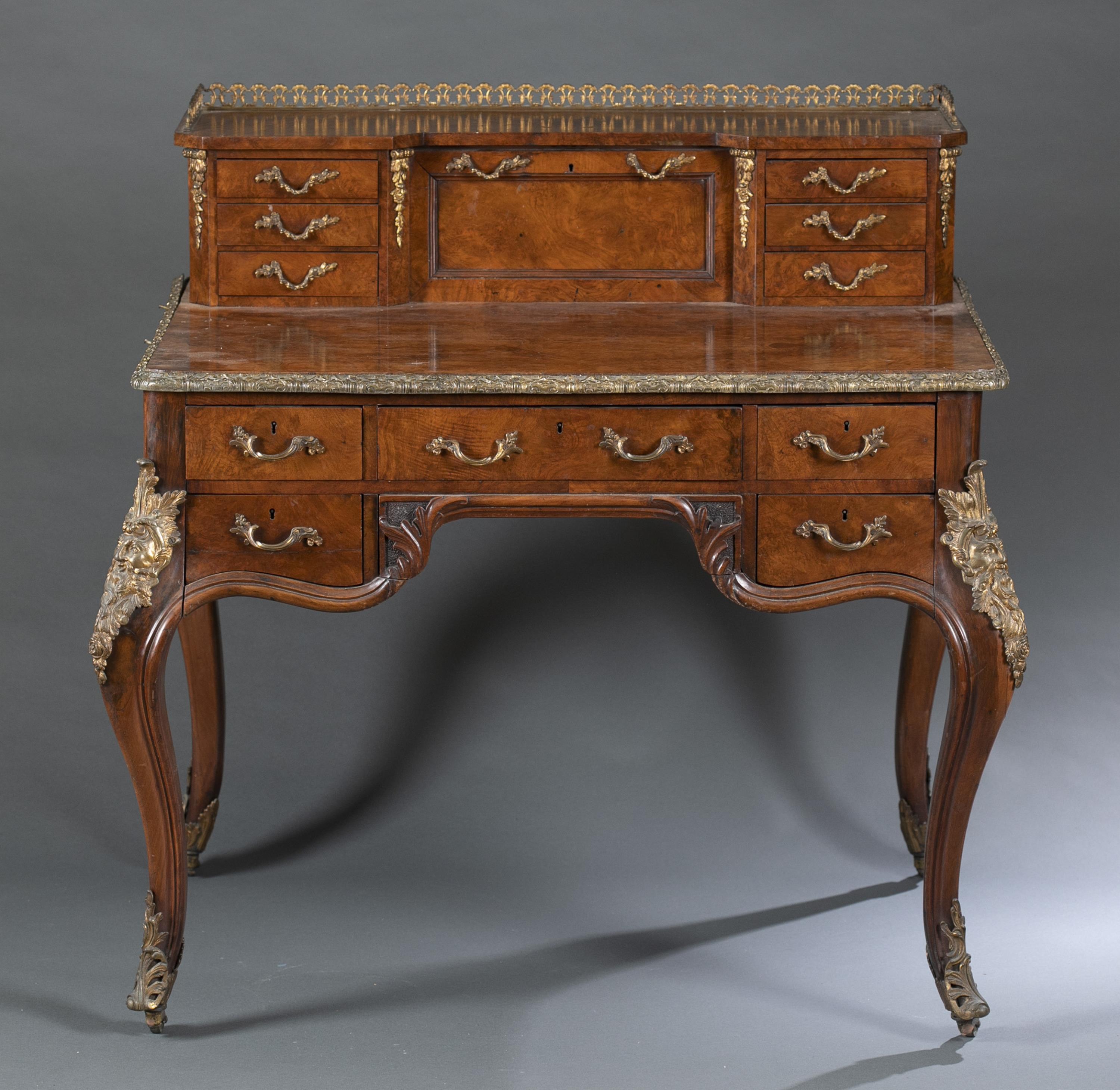 Louis XV style burlwood desk.