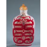 Chinese red Peking glass snowflake snuff bottle.