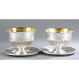 Pair of Swedish silver footed bowl on saucers.