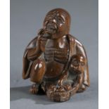 Wood netsuke of man and monkey, 19th c.