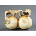 Ivory netsuke of 2 loquats, 19th c., Dokuraku
